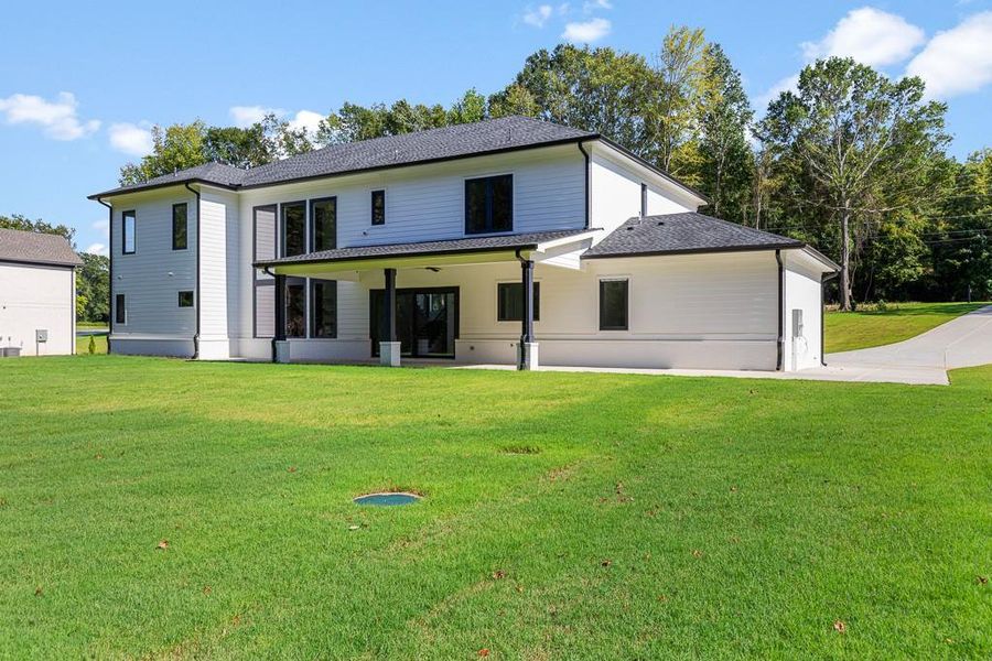 Front exterior of a new home in , Jefferson, GA, highlighting curb appeal (Image 23).