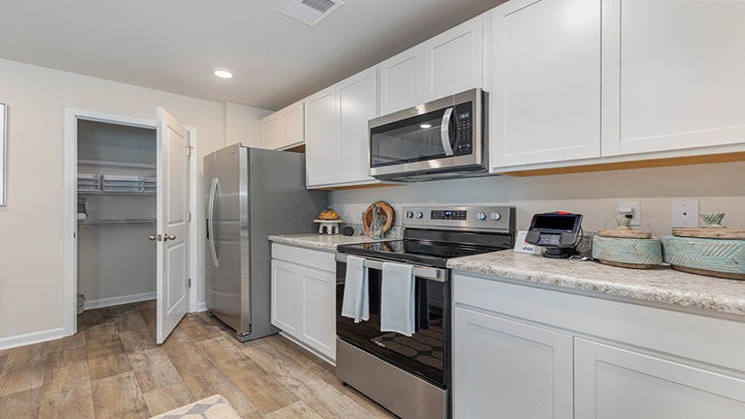 Furnished interior view inside a new home in Cottonwood Place, Tabor City (Image 24). Furnished interior view inside a new home in Cottonwood Place, Tabor City (Image 24).