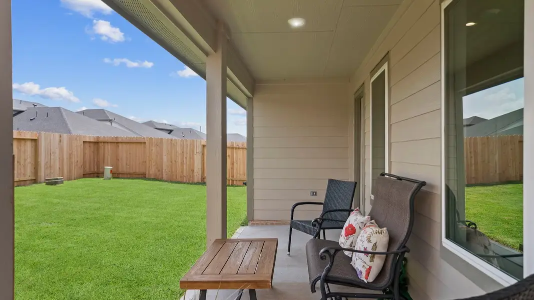 Exterior details and patio area of a home in Emberly, Beasley (Image 3).