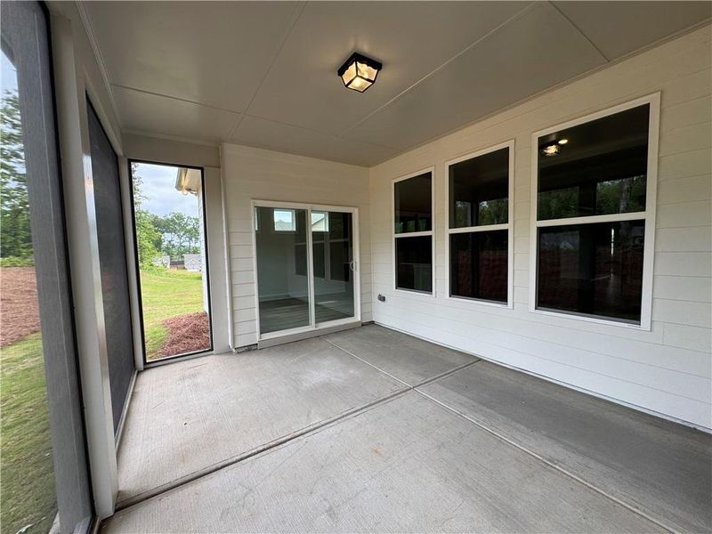 Exterior details and patio area of a home in Rosewood Lake Preserve, Hoschton (Image 3).