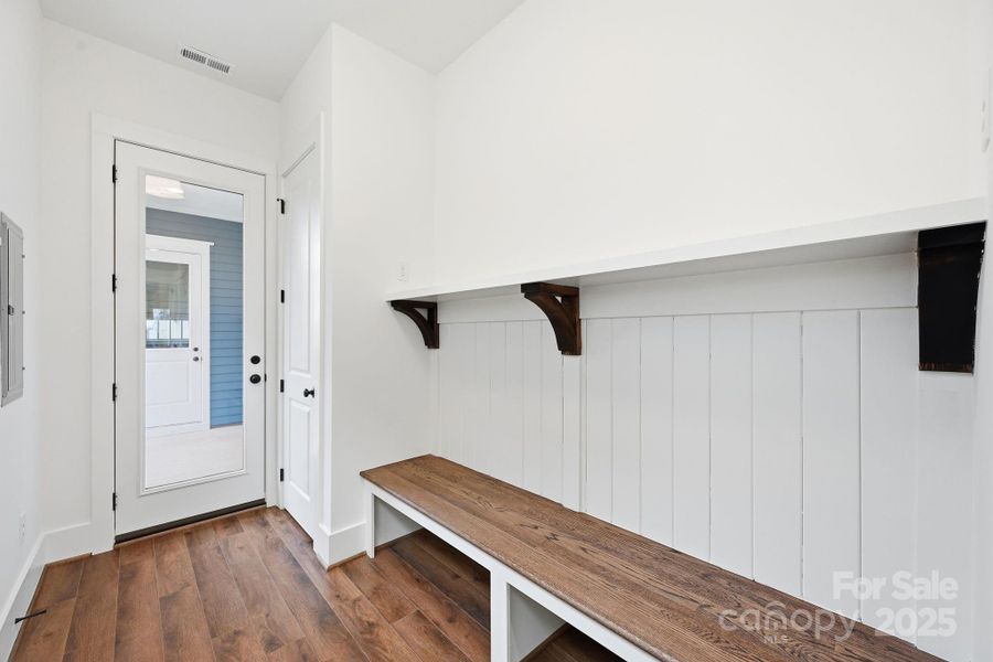 Convenient drop zone and closet space located at the rear entry provides the perfect spot for coats and daily storage. Convenient drop zone and closet space located at the rear entry provides the perfect spot for coats and daily storage.