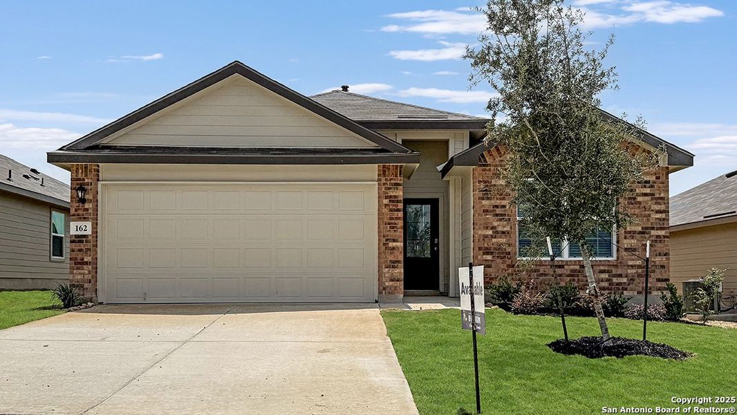 Front exterior of a new home in Redbird Ranch, San Antonio, TX, highlighting curb appeal (Image 13). Front exterior of a new home in Redbird Ranch, San Antonio, TX, highlighting curb appeal (Image 13).