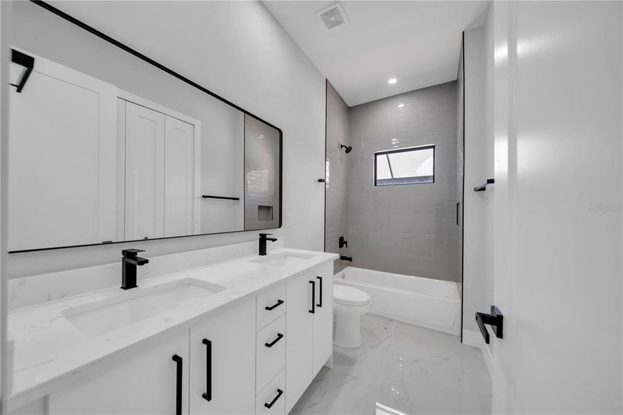 Furnished interior view inside a new home in , Port Charlotte (Image 11). Furnished interior view inside a new home in , Port Charlotte (Image 11).