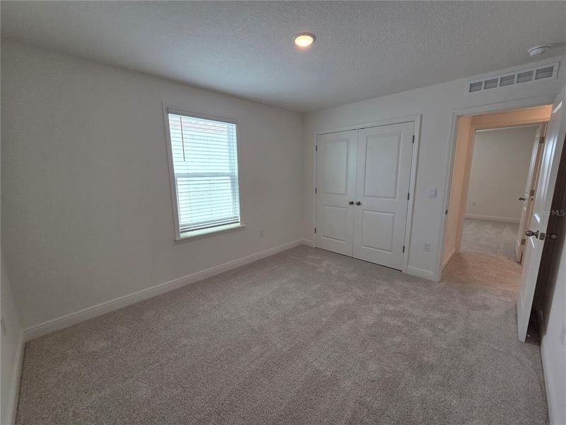 Spacious, unfurnished interior of a new home in Villamar, Winter Haven (Image 24).