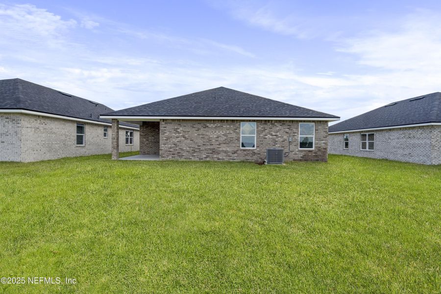 Exterior details and patio area of a home in Shadow Crest at Rolling Hills, Green Cove Springs (Image 20). Exterior details and patio area of a home in Shadow Crest at Rolling Hills, Green Cove Springs (Image 20).