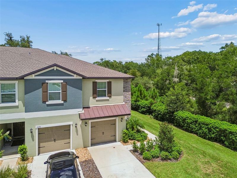 Front exterior of a new home in , Land O' Lakes, FL, highlighting curb appeal (Image 26).