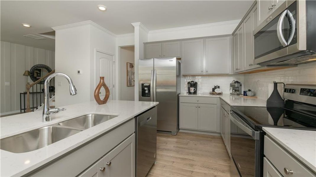Furnished interior view inside a new home in Harvest Park, Decatur (Image 11).