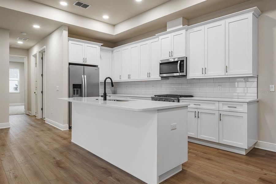 Furnished interior view inside a new home in , Clearwater (Image 9). Furnished interior view inside a new home in , Clearwater (Image 9).