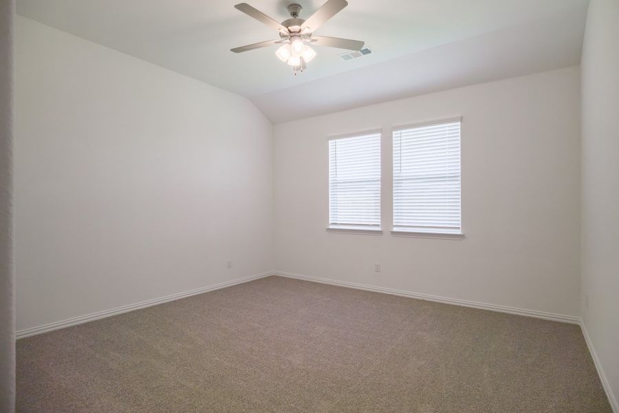Spacious, unfurnished interior of a new home in The Villages of Hurricane Creek, Anna (Image 32).