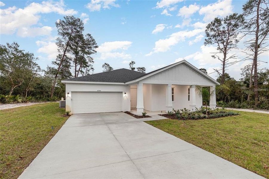 PHOTO OF FULLY COMPLETED MODEL HOME - SAME FLOOR PLAN