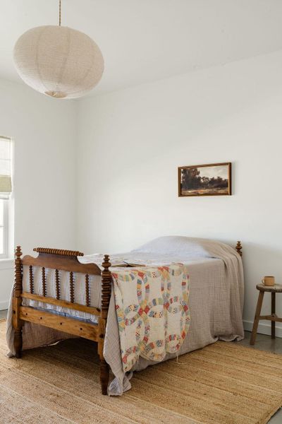 Bedroom featuring baseboards