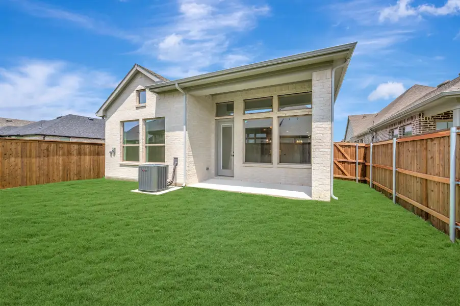 Exterior details and patio area of a home in Creekshaw – Gardens, Royse City (Image 3). Exterior details and patio area of a home in Creekshaw – Gardens, Royse City (Image 3).