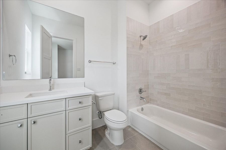 Beautiful secondary bath with timeless finishes.