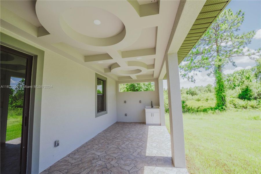 Exterior details and patio area of a home in , Lehigh Acres (Image 3).