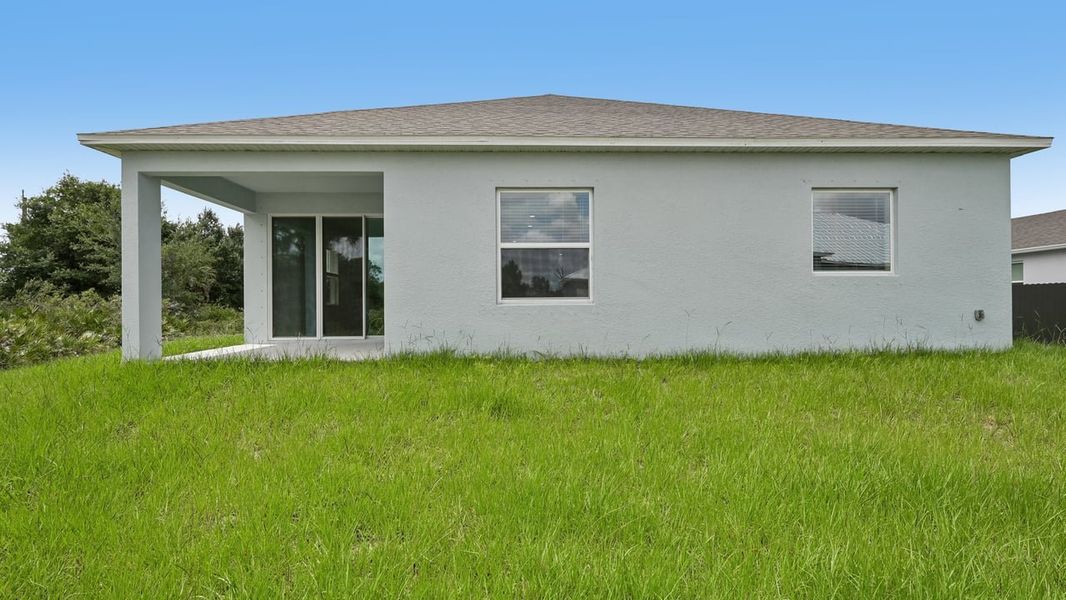 Exterior details and patio area of a home in Port Charlotte, Port Charlotte (Image 4).