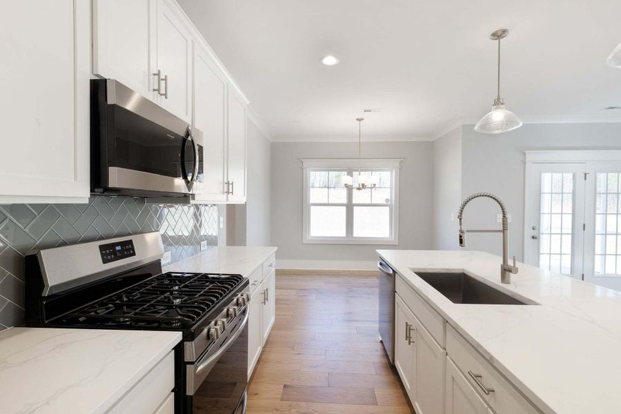 Representative furnished interior of a home built from the Austin by Caviness & Cates Communities in Bartlett Manor, Youngsville (Image 115).