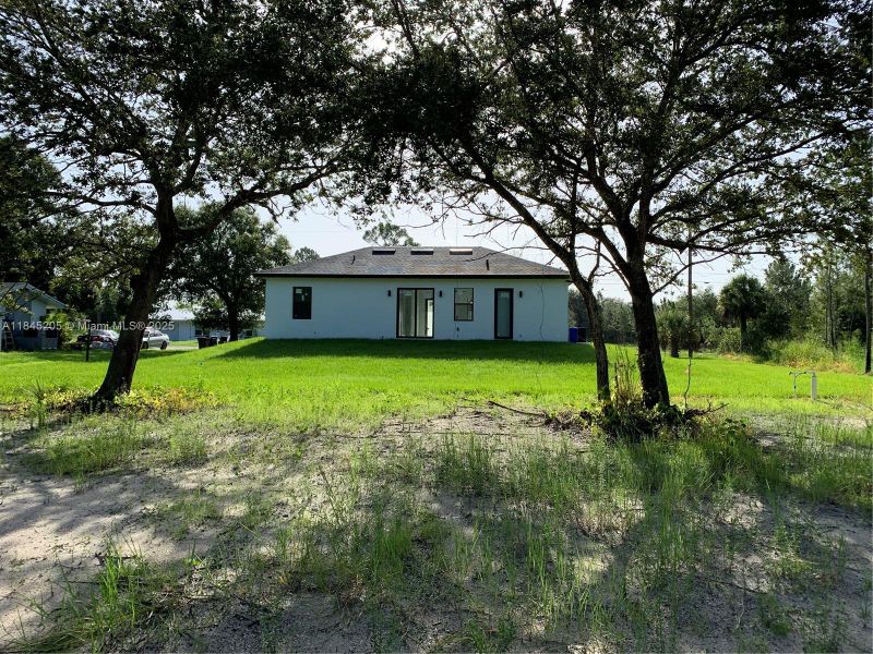Exterior details and patio area of a home in , Lehigh Acres (Image 21). Exterior details and patio area of a home in , Lehigh Acres (Image 21).