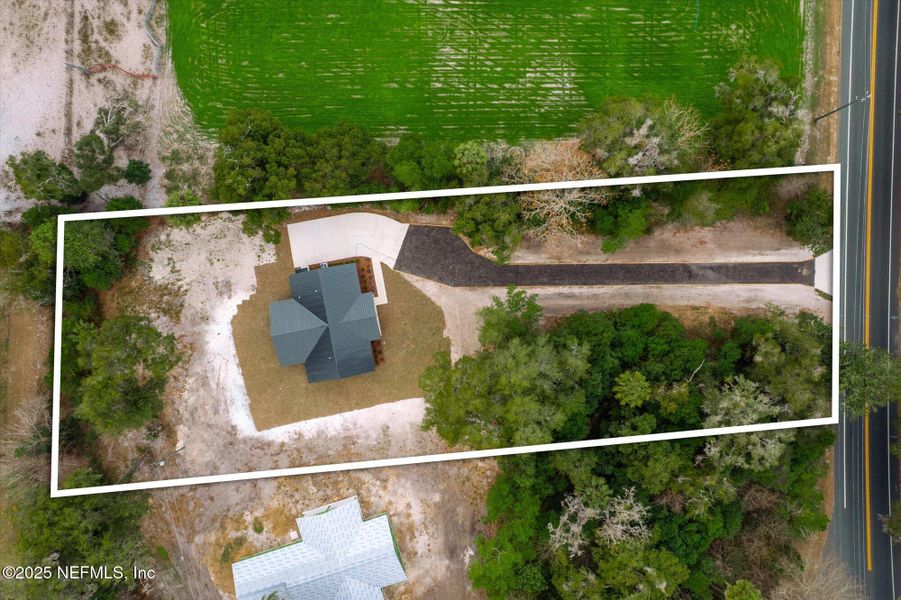 Front exterior of a new home in , San Mateo, FL, highlighting curb appeal (Image 35). Front exterior of a new home in , San Mateo, FL, highlighting curb appeal (Image 35).