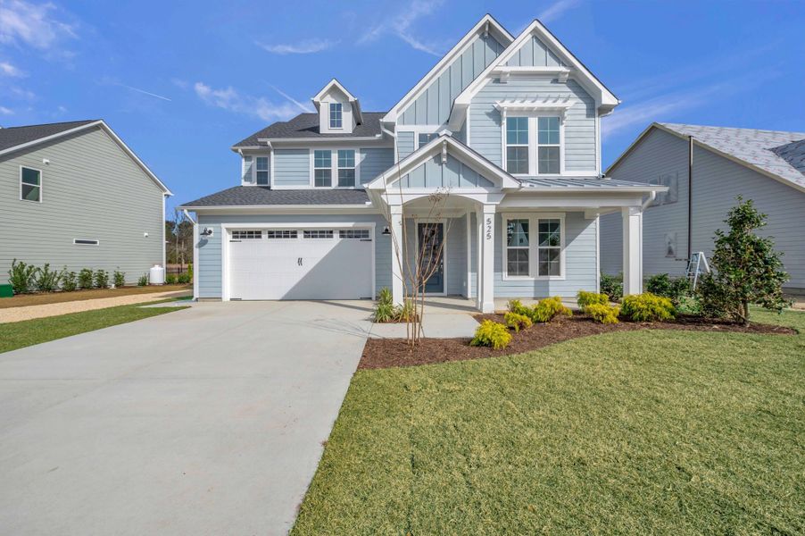 Representative exterior photo of a completed home built from the The Hampton by RobuckHomes in Windwater, Hampstead, NC (Image 32).