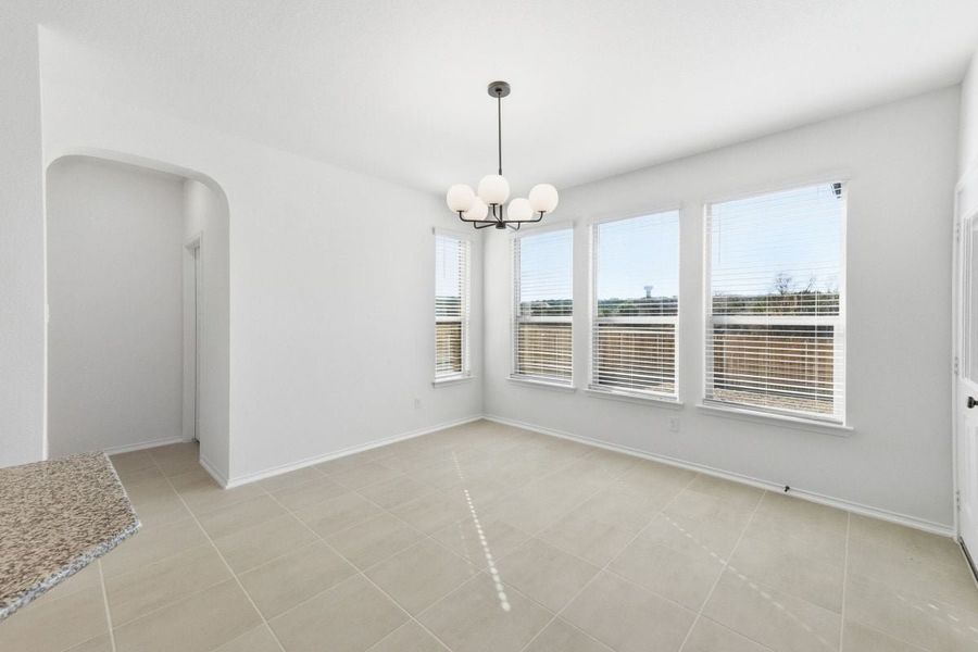 Spacious, unfurnished interior of a new home in River Bluff, Leander (Image 7).