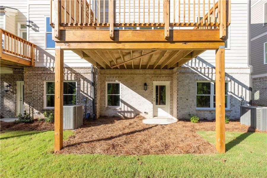 Front exterior of a new home in Evanshire Townhomes, Duluth, GA, highlighting curb appeal (Image 23).