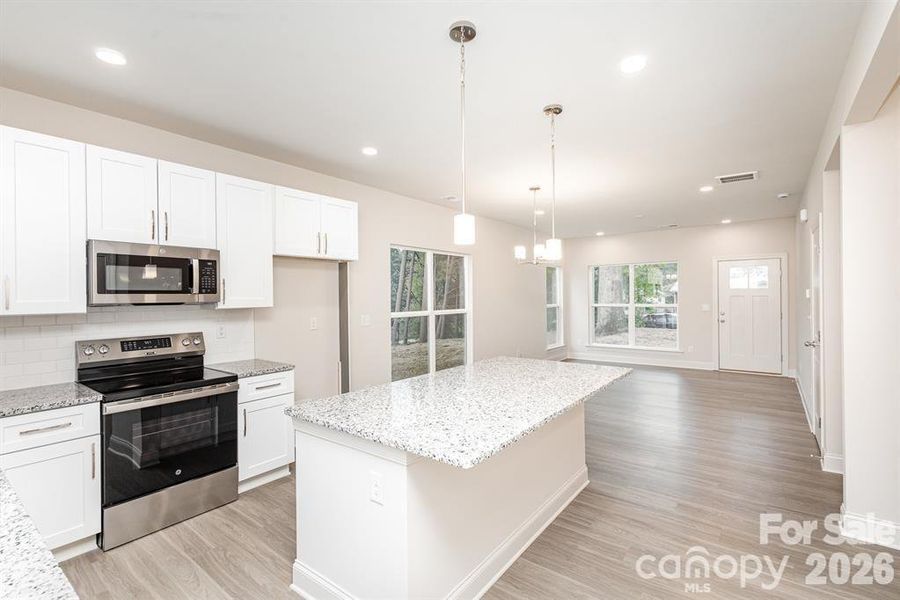 Furnished interior view inside a new home in , Statesville (Image 5).