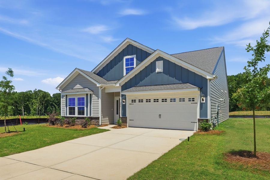 Front exterior of a new home in Willowbrook, Shelby, NC, highlighting curb appeal (Image 2). Front exterior of a new home in Willowbrook, Shelby, NC, highlighting curb appeal (Image 2).