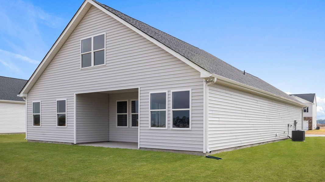 Exterior details and patio area of a home in East Ridge, Ayden (Image 20).