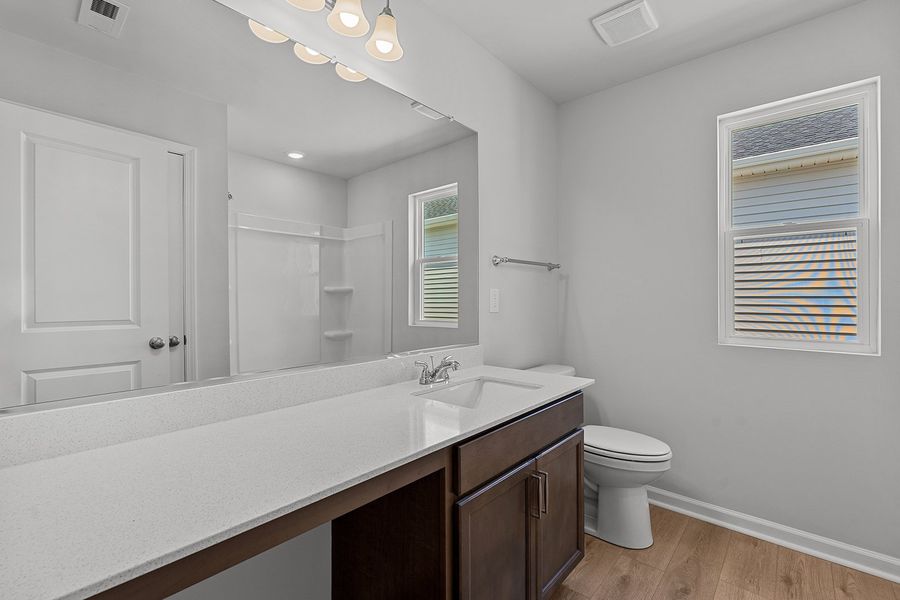 Furnished interior view inside a new home in Hanes Lake, Winston-Salem (Image 27). Furnished interior view inside a new home in Hanes Lake, Winston-Salem (Image 27).