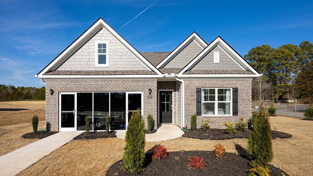 Front exterior of a new home in Lone Oaks Farm, Cleveland, TN, highlighting curb appeal (Image 2).