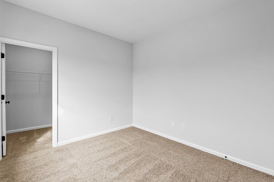 Spacious, unfurnished interior of a new home in Lilah Grove, Summerfield (Image 48).