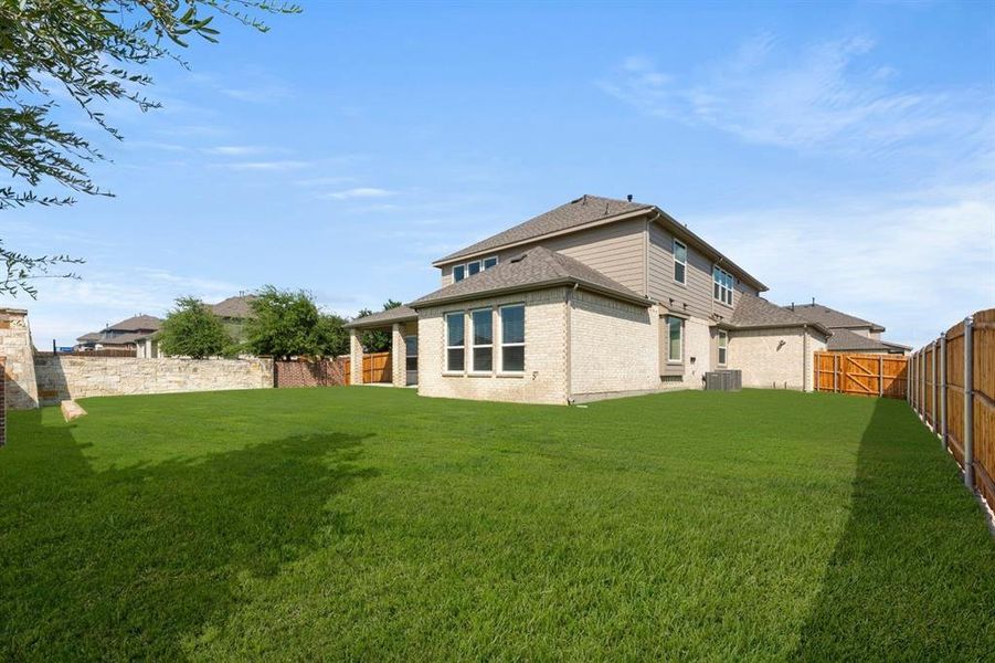 Front exterior of a new home in Woodcreek, Rockwall, TX, highlighting curb appeal (Image 20).