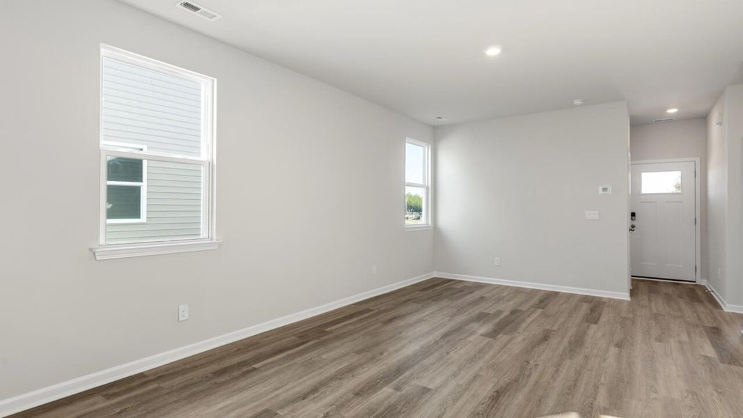 Representative unfurnished interior of a home built from the DELANEY by D.R. Horton in The Cottages at Blake Farm, Wilmington (Image 11). Representative unfurnished interior of a home built from the DELANEY by D.R. Horton in The Cottages at Blake Farm, Wilmington (Image 11).