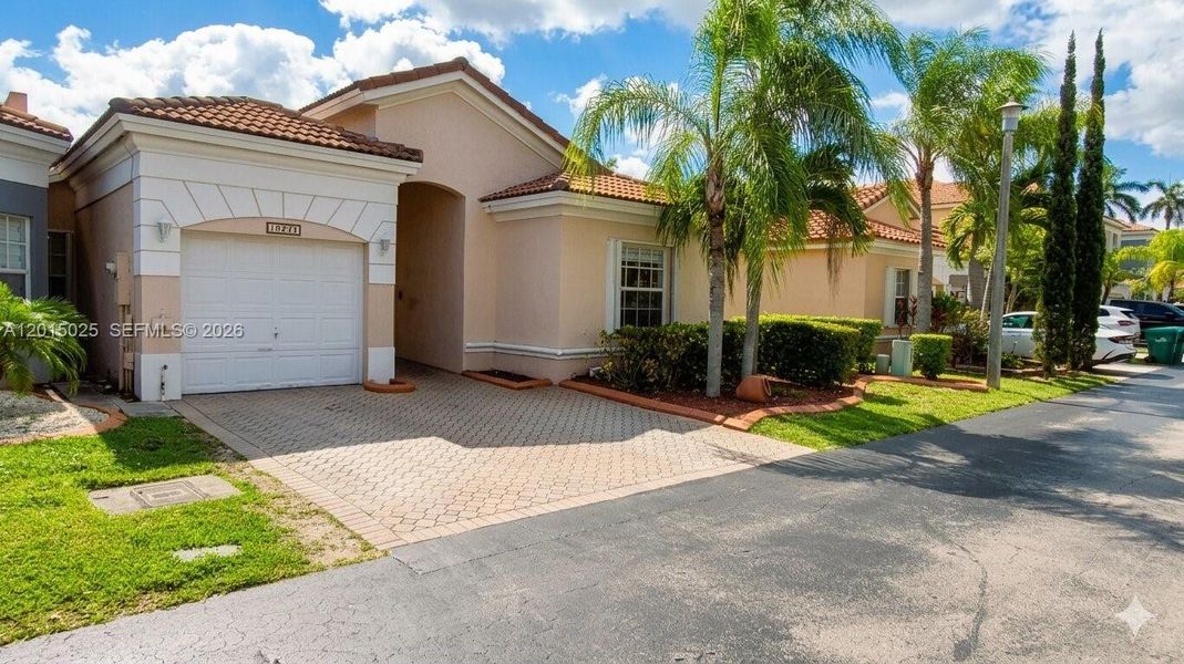 Front exterior of a new home in , Miami, FL, highlighting curb appeal (Image 2). Front exterior of a new home in , Miami, FL, highlighting curb appeal (Image 2).