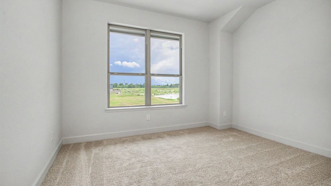Spacious, unfurnished interior of a new home in Legacy Prairie at Katy Court, Katy (Image 14).
