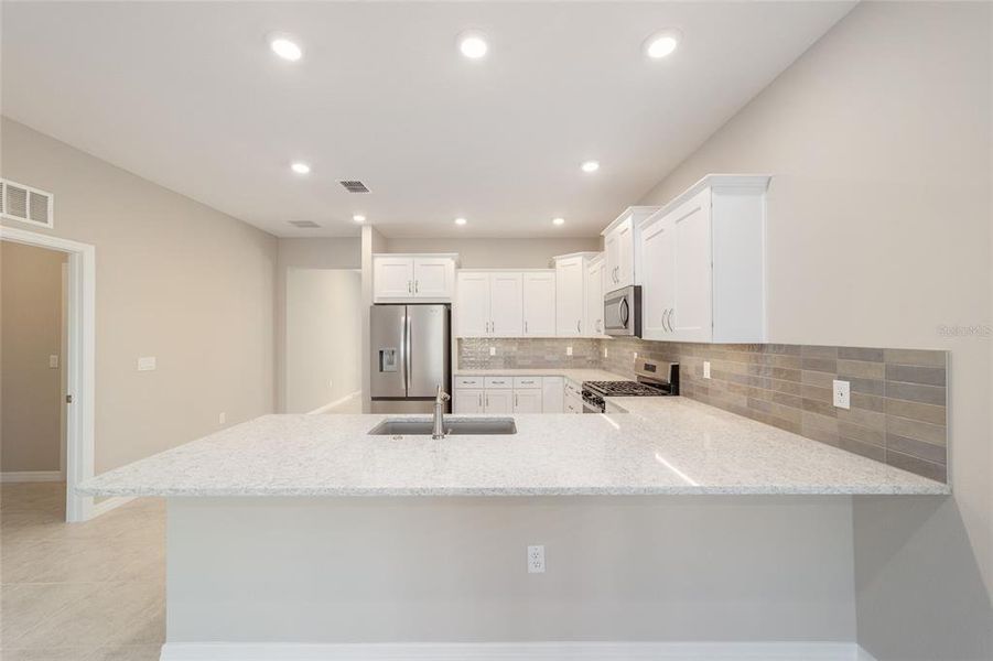 Furnished interior view inside a new home in Calesa Township, Ocala (Image 6).