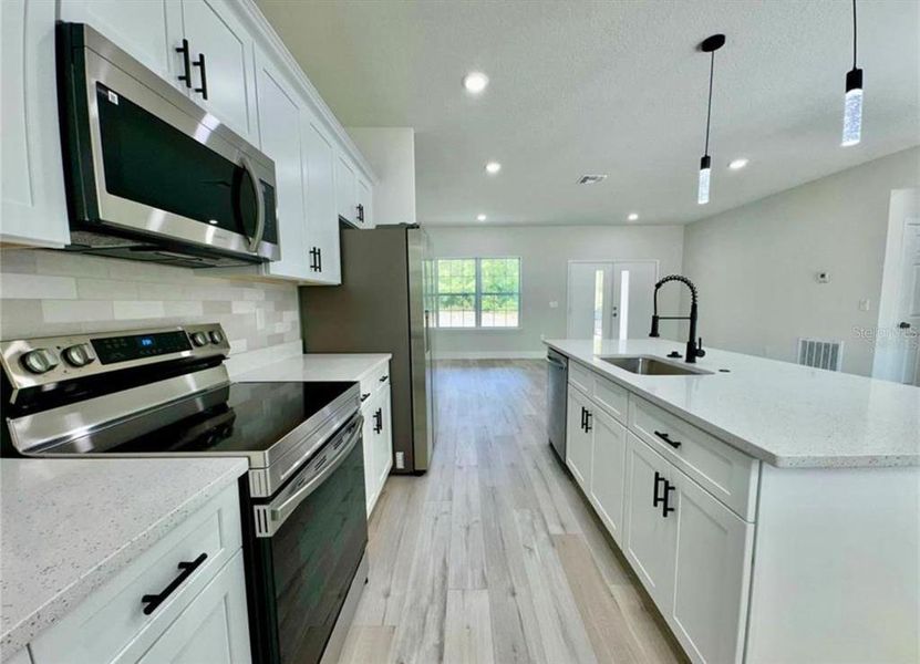 Furnished interior view inside a new home in , Citrus Springs (Image 6).
