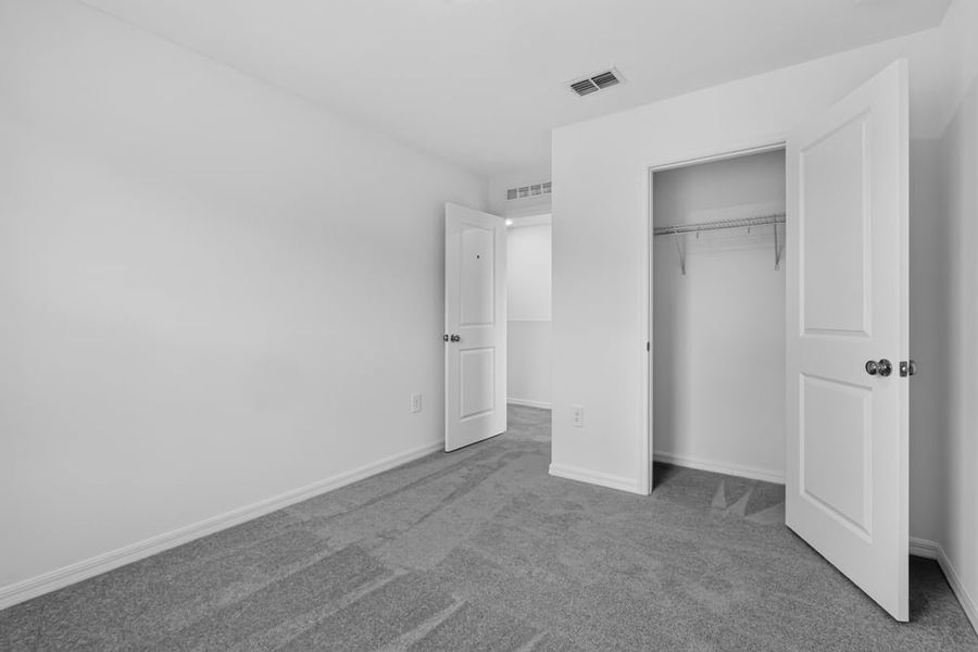 Representative unfurnished interior of a home built from the Kingfisher by Taylor Morrison in Palm Wind, Hudson (Image 13).