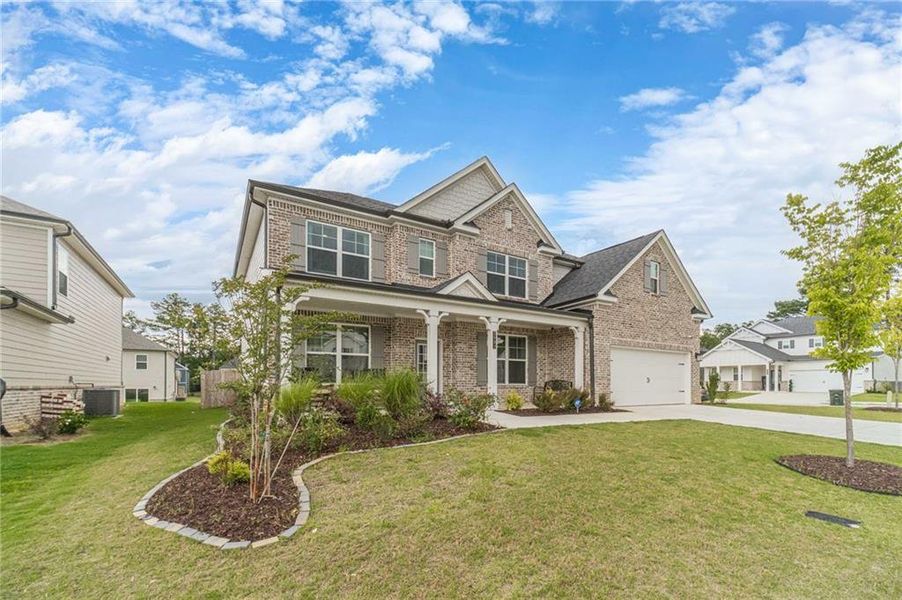 Front exterior of a new home in , Grayson, GA, highlighting curb appeal (Image 2). Front exterior of a new home in , Grayson, GA, highlighting curb appeal (Image 2).