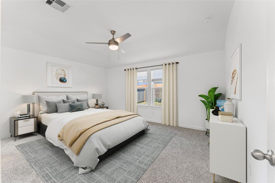 Escape to this massive private retreat that offers more than enough room for a king-sized furniture suite. Large windows frame a peaceful view of the backyard, creating a serene atmosphere to wake up to every morning.(virtual staged)