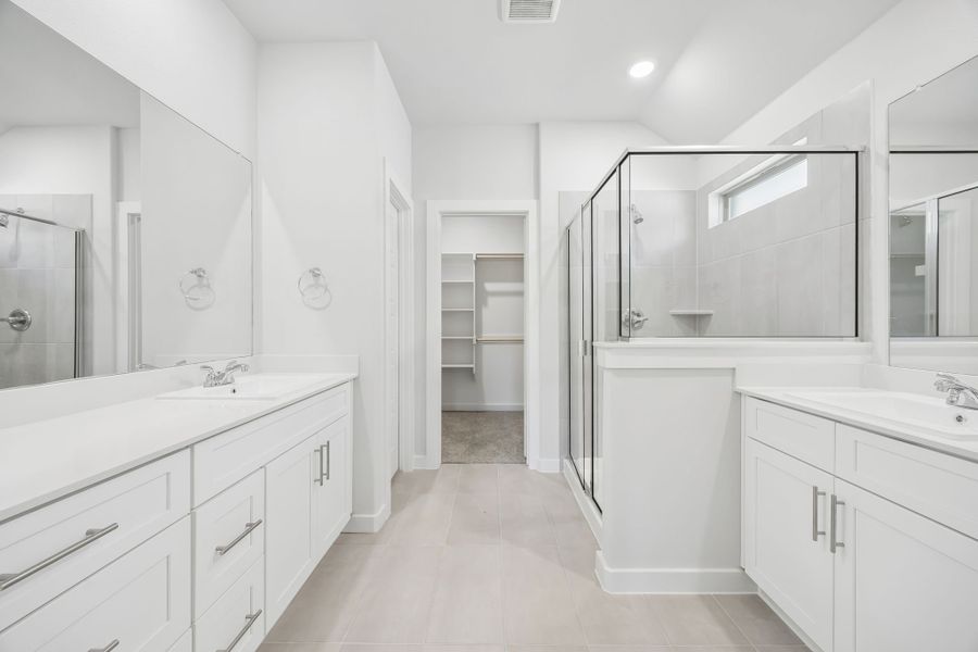 Primary bathroom in the Heisman home plan by Trophy Signature Homes – REPRESENTATIVE PHOTO Primary bathroom in the Heisman home plan by Trophy Signature Homes – REPRESENTATIVE PHOTO