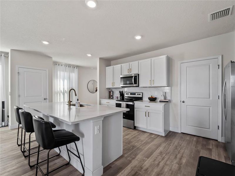 Furnished interior view inside a new home in Star Farms at Lakewood Ranch, Bradenton (Image 9).