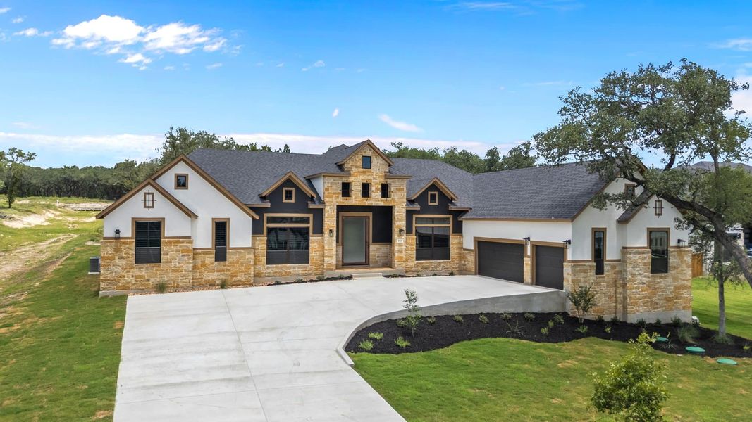 Representative exterior photo of a completed home built from the Grant by Chesmar Homes in Heimer Estates at Garden Ridge, San Antonio, TX (Image 8). Representative exterior photo of a completed home built from the Grant by Chesmar Homes in Heimer Estates at Garden Ridge, San Antonio, TX (Image 8).