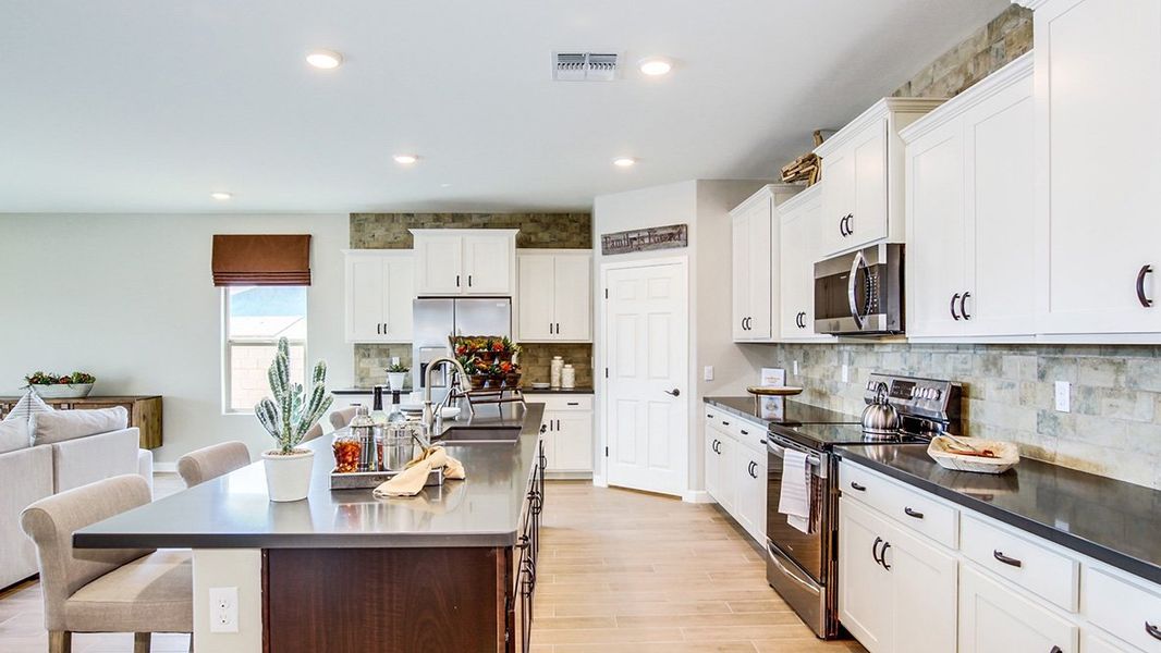 Representative furnished interior of a home built from the Citrine - Plan 5042 by D.R. Horton in Sycamore Vista, Vail (Image 13). Representative furnished interior of a home built from the Citrine - Plan 5042 by D.R. Horton in Sycamore Vista, Vail (Image 13).
