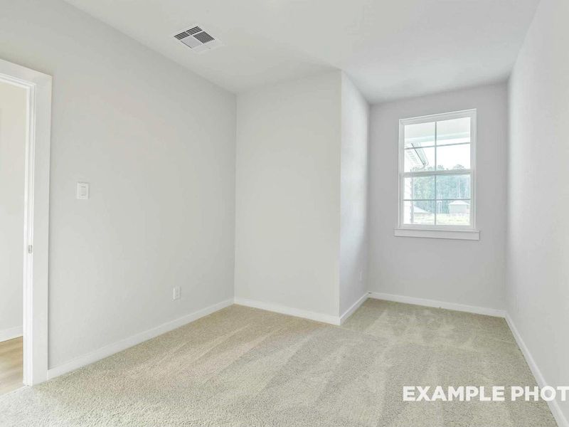 Spacious, unfurnished interior of a new home in Caney Creek Place, Conroe (Image 21).
