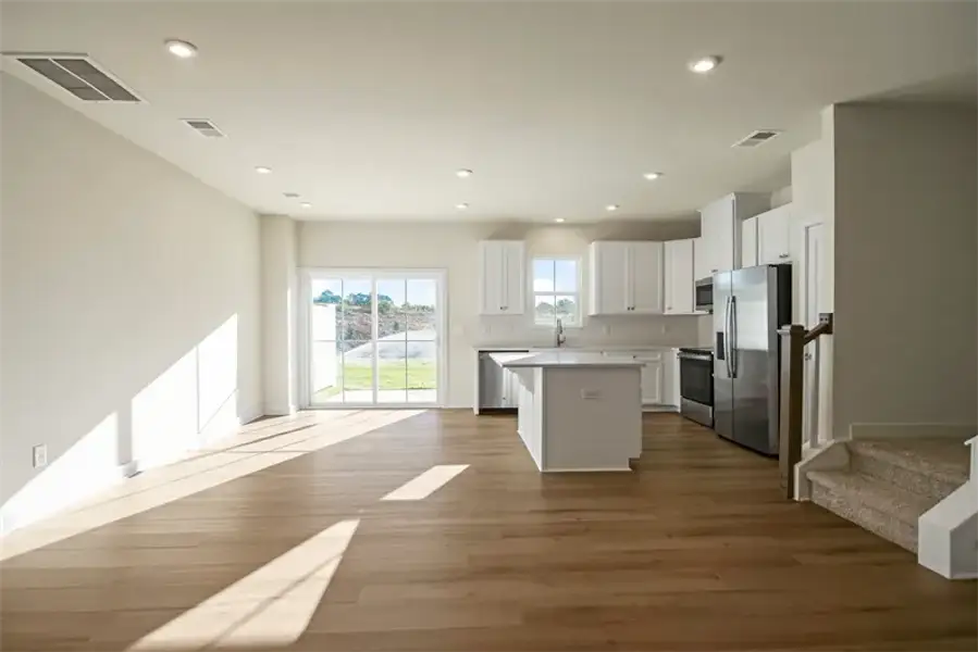 Spacious, unfurnished interior of a new home in Townes At Abner Creek, Greer (Image 7).