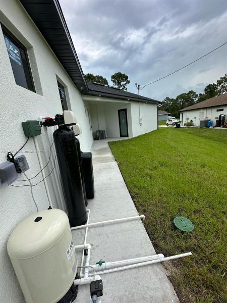 Exterior details and patio area of a home in , Lehigh Acres (Image 25).