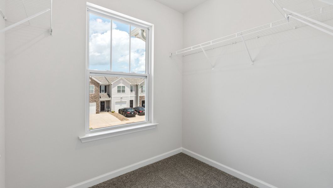 Spacious, unfurnished interior of a new home in Tanglewood Townes, Greenville (Image 25).
