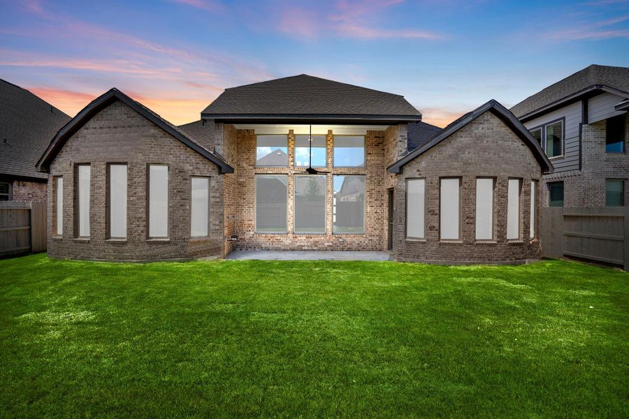 Front exterior of a new home in Pomona 60', Manvel, TX, highlighting curb appeal (Image 22). Front exterior of a new home in Pomona 60', Manvel, TX, highlighting curb appeal (Image 22).