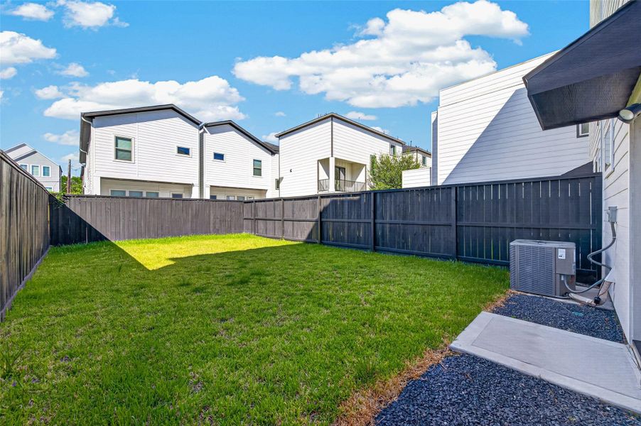 Exterior details and patio area of a home in , Houston (Image 3).